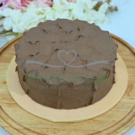 Belgian Malt Cake - A round chocolate cake with a smooth and shiny chocolate glaze on top