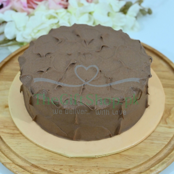 Belgian Malt Cake - A round chocolate cake with a smooth and shiny chocolate glaze on top