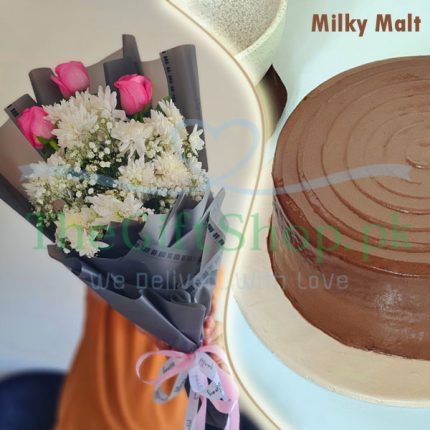 Milky Malt Delight: A photo of a chocolate cake with a milky malt label and a bouquet of pink and white flowers wrapped in paper.